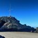 Cave Rock, a volcanic formation with a crevice at its base and a tall antenna on top, in Christchurch